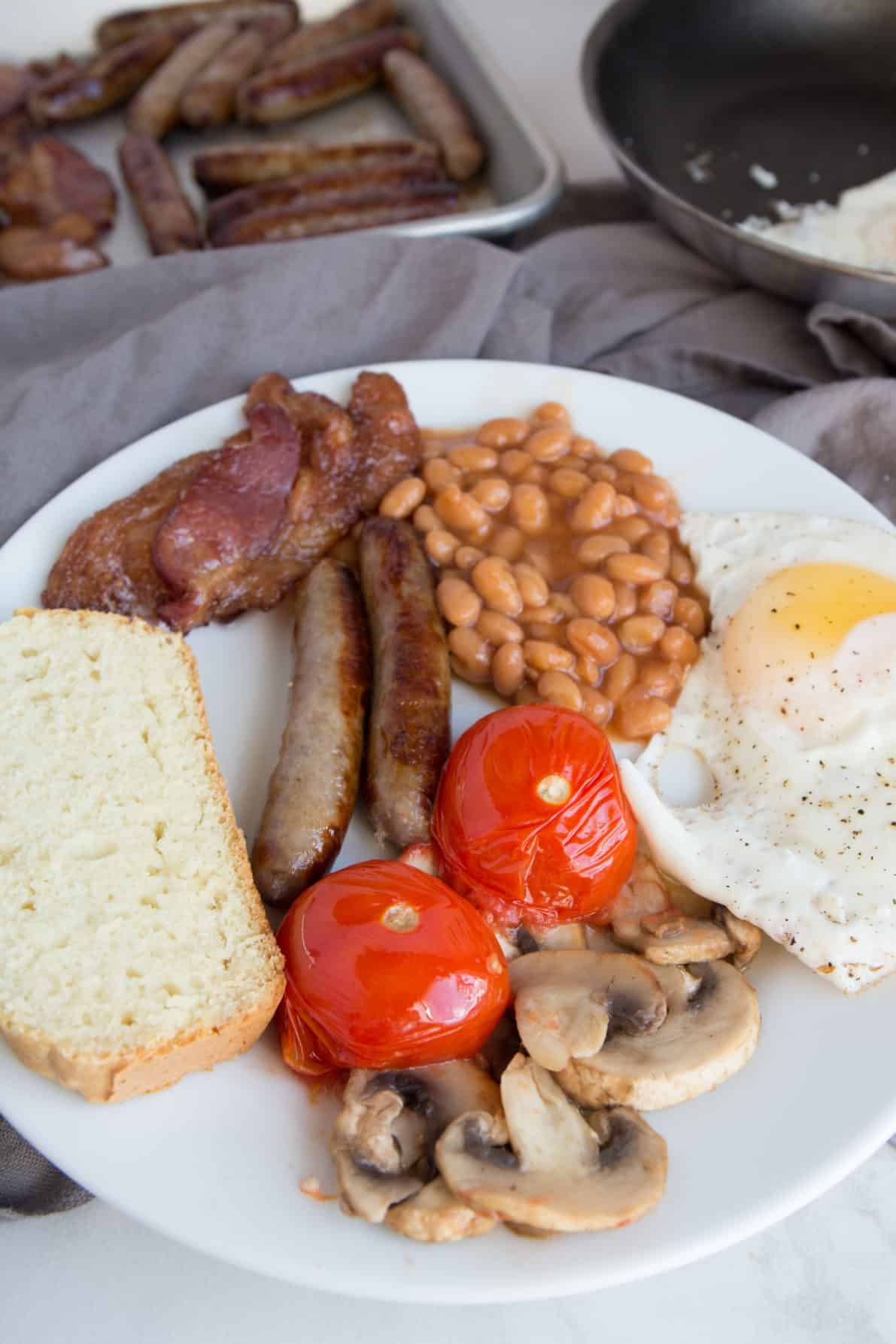 An Irish Breakfast laid out on a plate for serving.