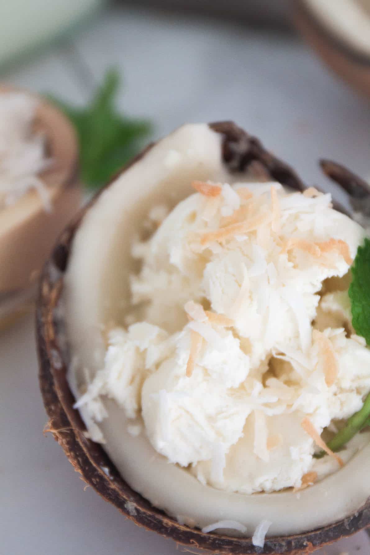 No Churn Creamy Coconut Ice Cream - Sweet, creamy, coconutty. This no churn coconut ice cream is simply delightful and is a cinch to make. And you don't even need to have an ice cream maker! | wanderzestblog.com