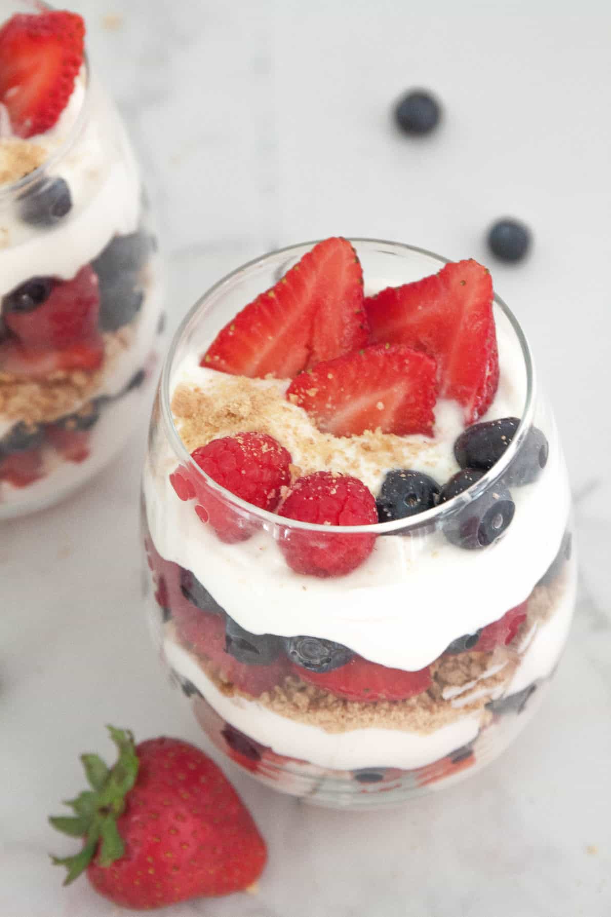 Berry Cheesecake Parfaits are an easy, no-bake dessert perfect for summer. Guaranteed to be the star of the show at your 4th of July party or any festivity!