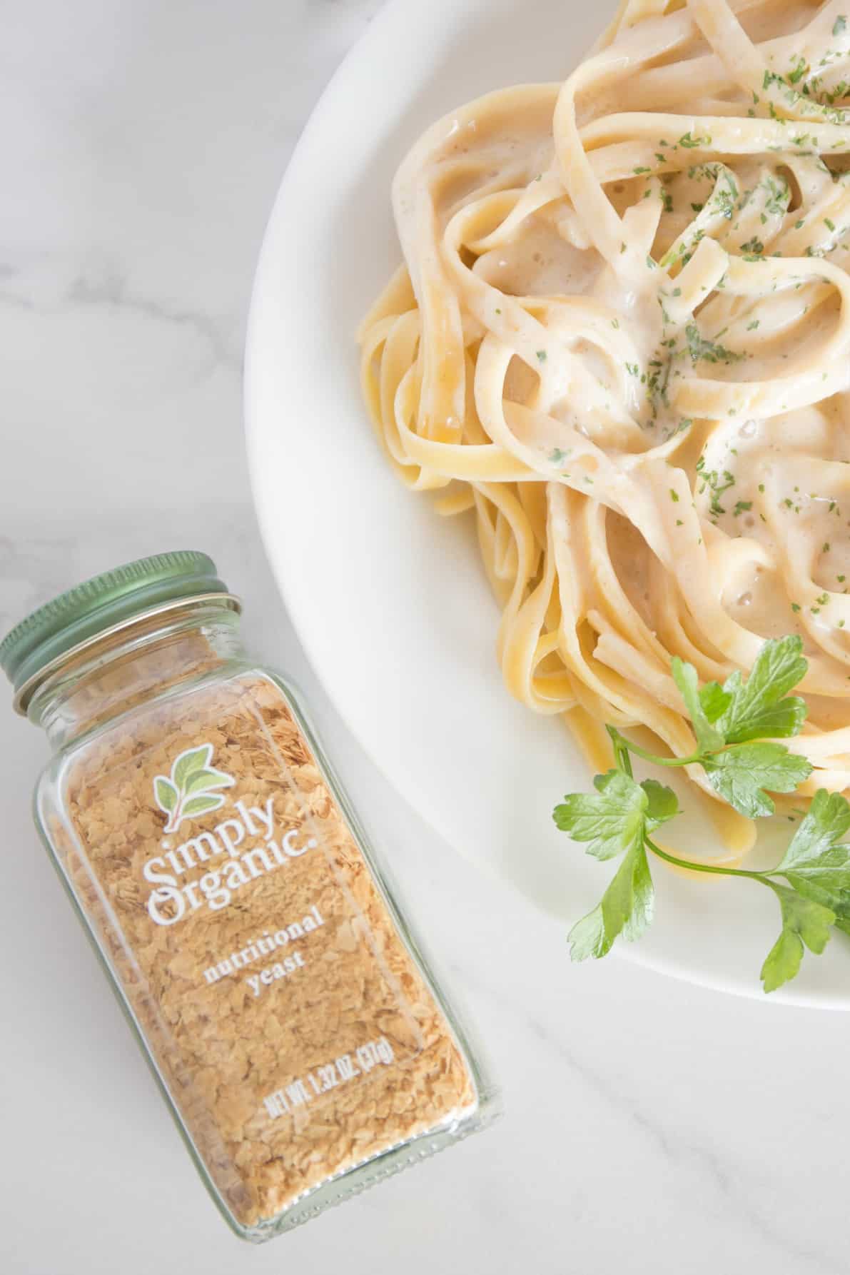 You don't need cream, parmesan or butter to make this Light Fettuccine Alfredo! It is just as good as the traditional sauce, yet has half the calories! 