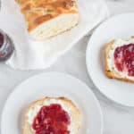 Slices of Brioche Bread topped with ricotta and jam.