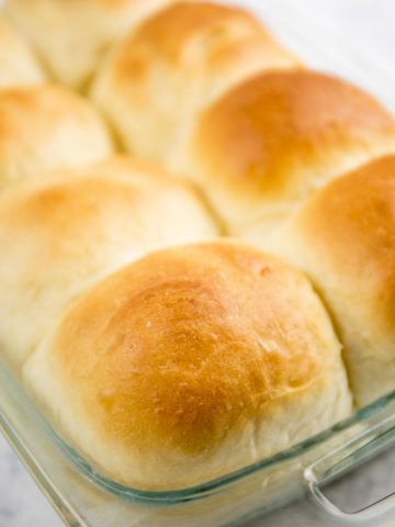Close up side view of milk bread rolls.