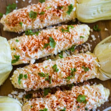 Mexican Street Corn on a wood surface.