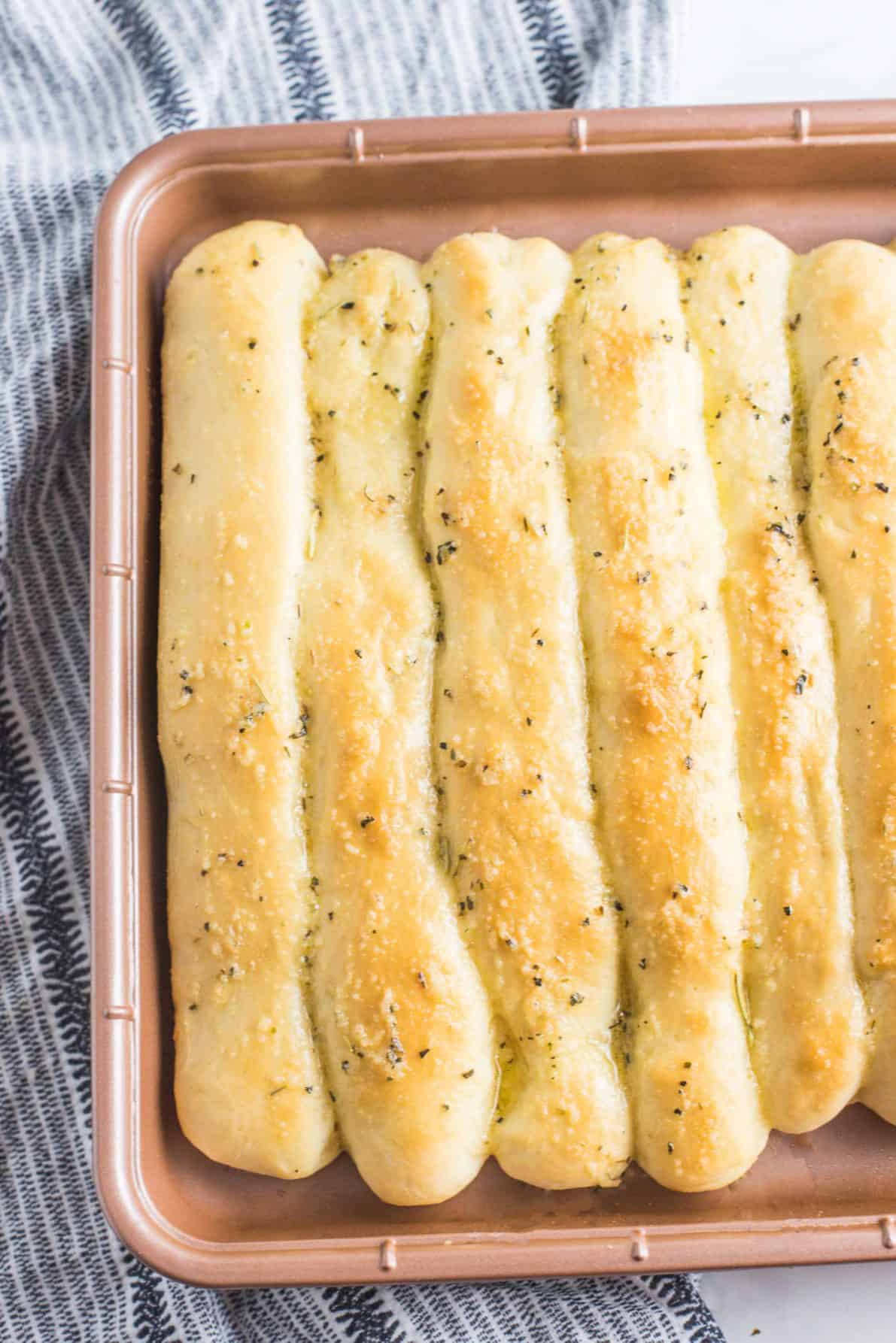 Soft & Fluffy Garlic Butter Breadsticks Recipe | Wanderzest