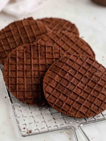 Chocolate Stroopwafels on a marble surface.