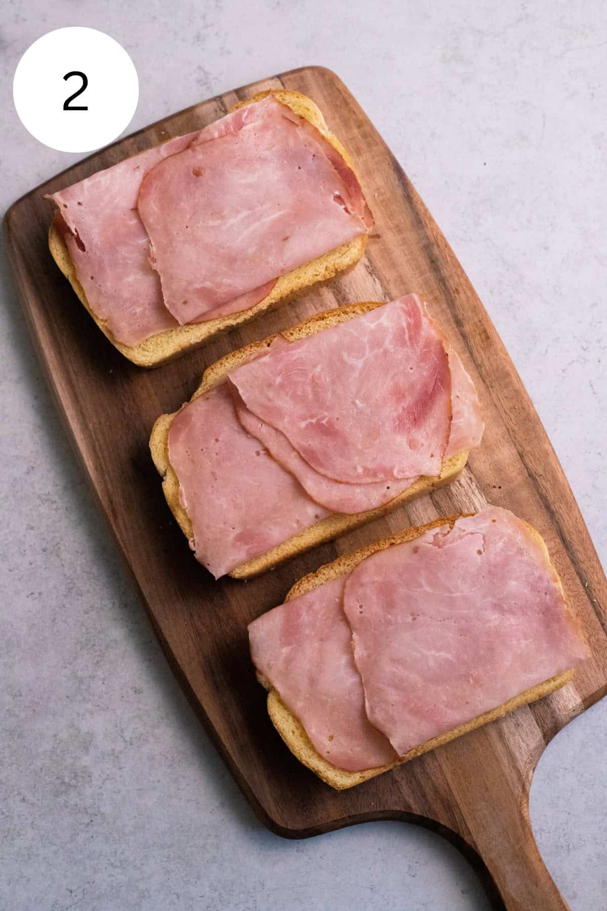 Monte Cristo Sandwiches with ham on top.