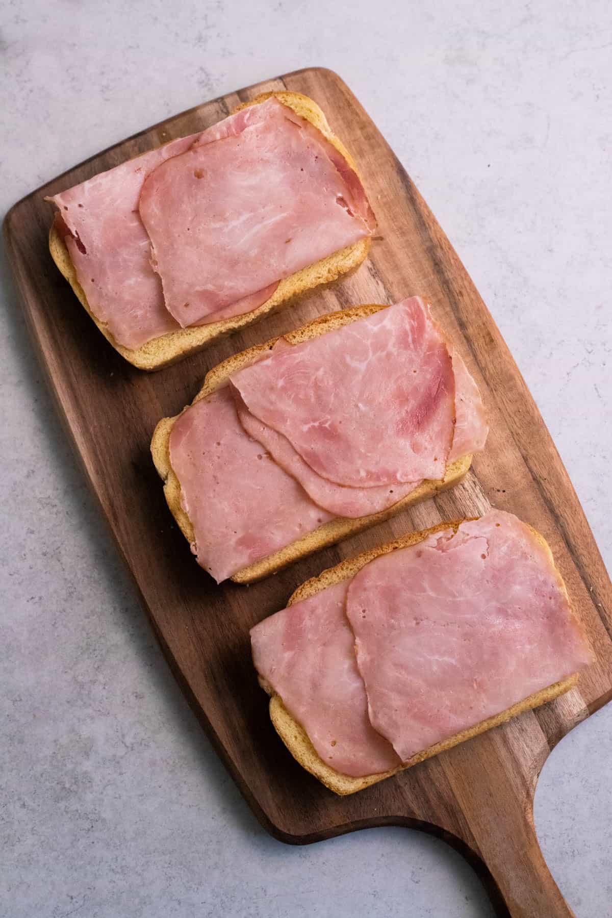 Monte Cristo Sandwiches with ham on top.