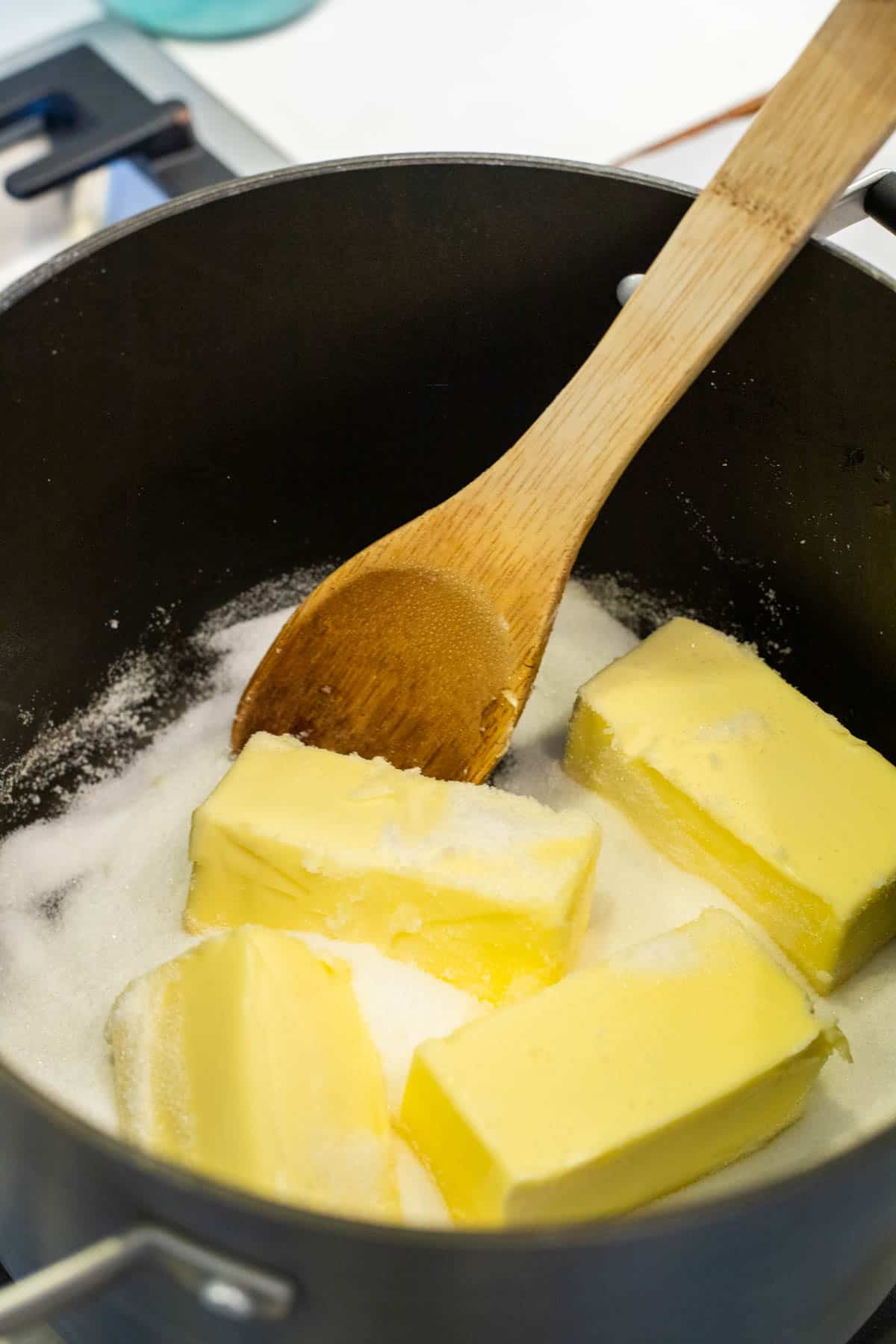 Butter and sugar in a saucepan.