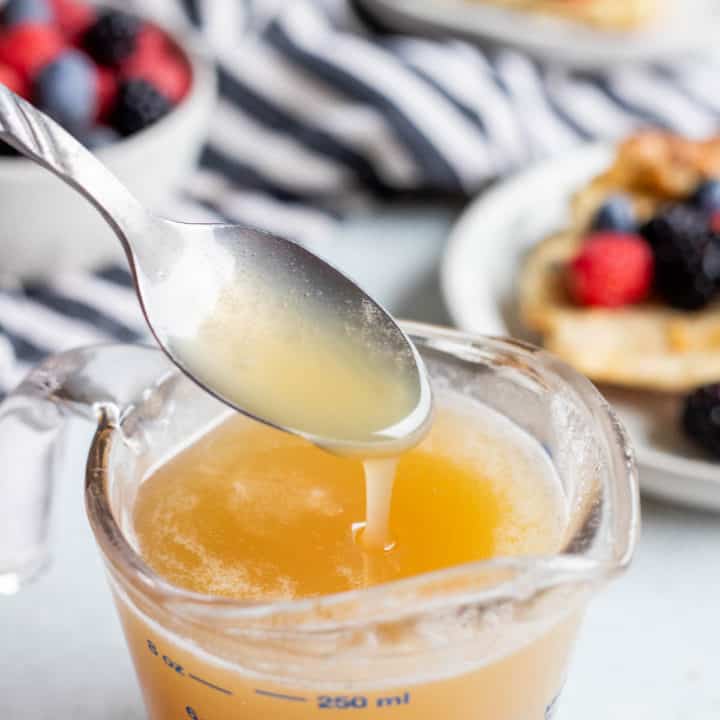 Buttermilk Syrup in a glass measuring cup.