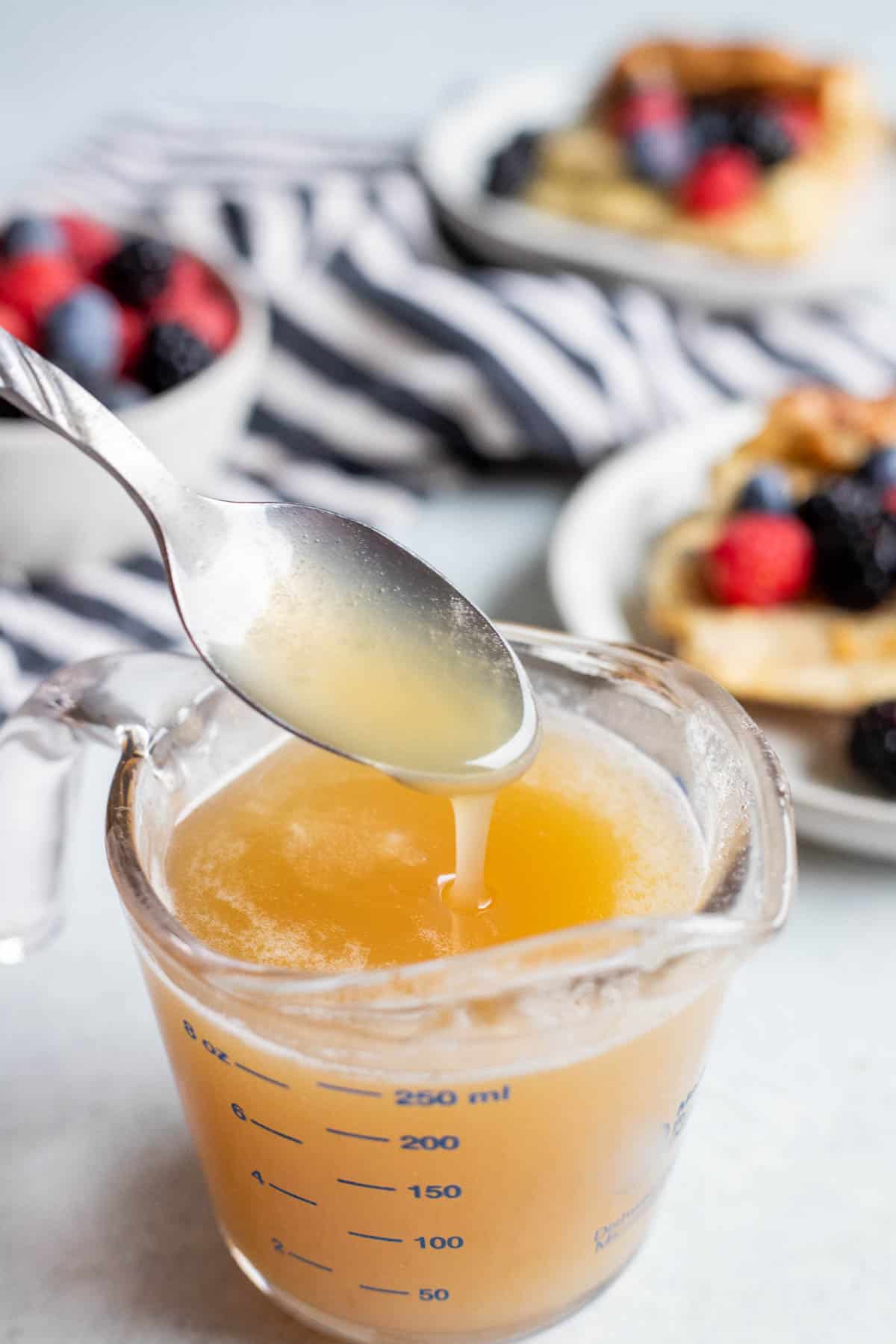 Buttermilk Syrup in a glass measuring cup.
