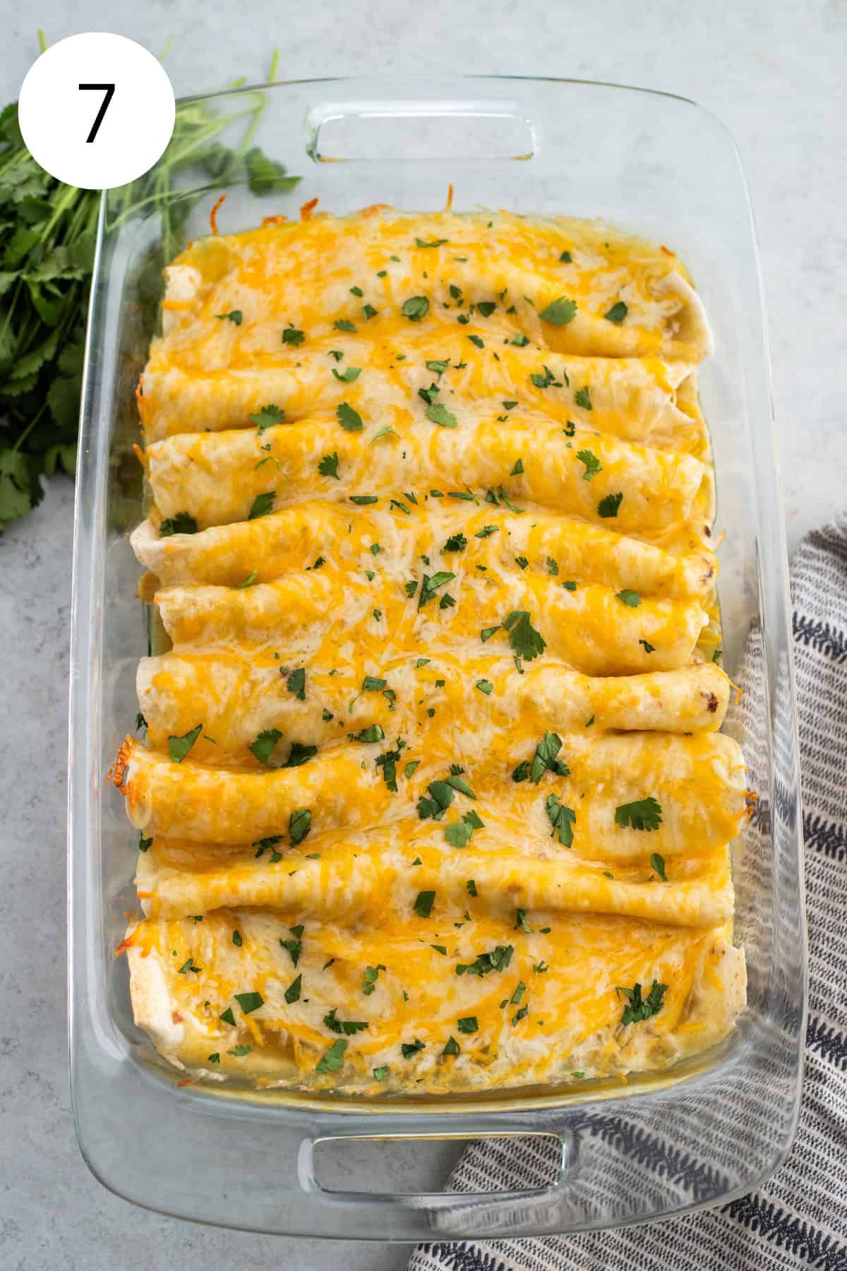 Baked enchiladas topped with fresh cilantro.