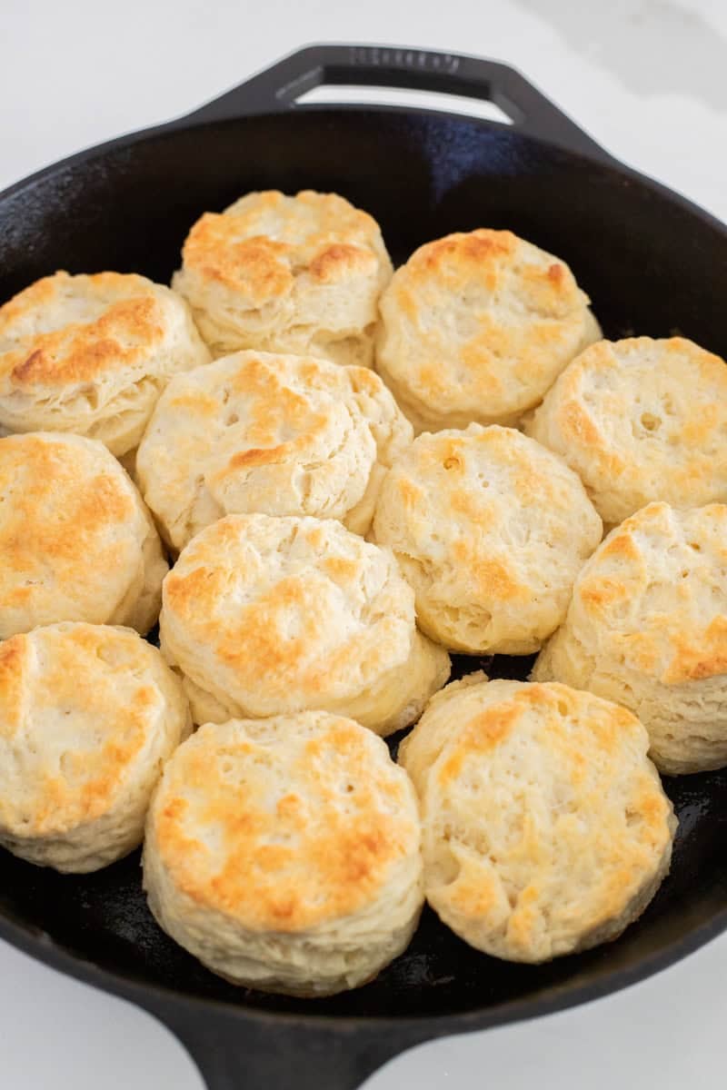 Golden biscuits in cast iron pan.
