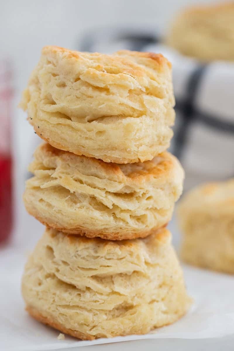 A stack of three buttermilk biscuits.