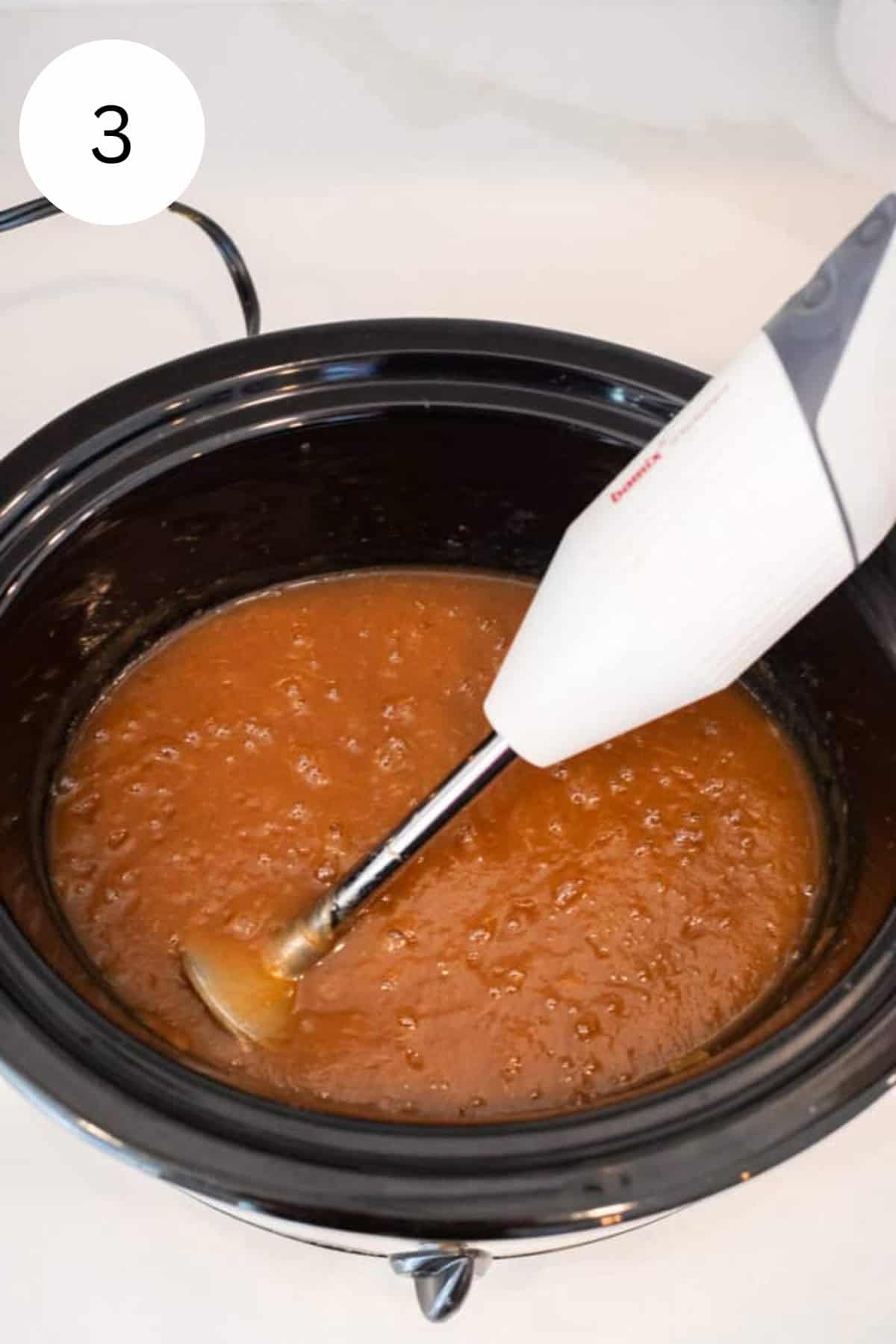 Apple butter in crockpot pureed with immersion blender.
