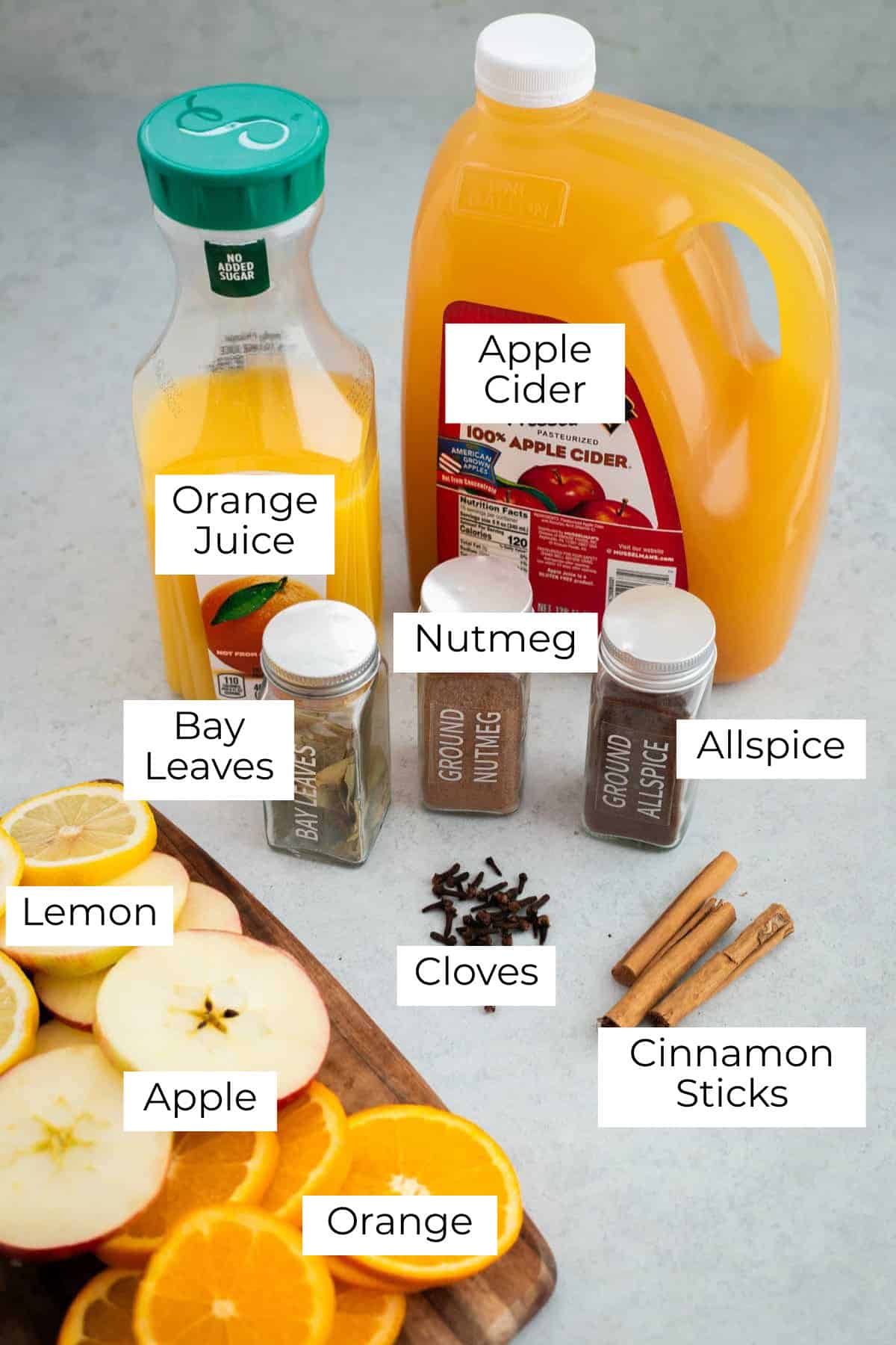 Labeled ingredients laid out for wassail recipe.