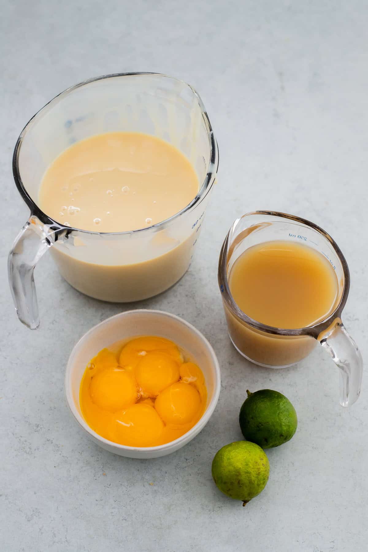 Ingredients laid out for key lime pie filling.
