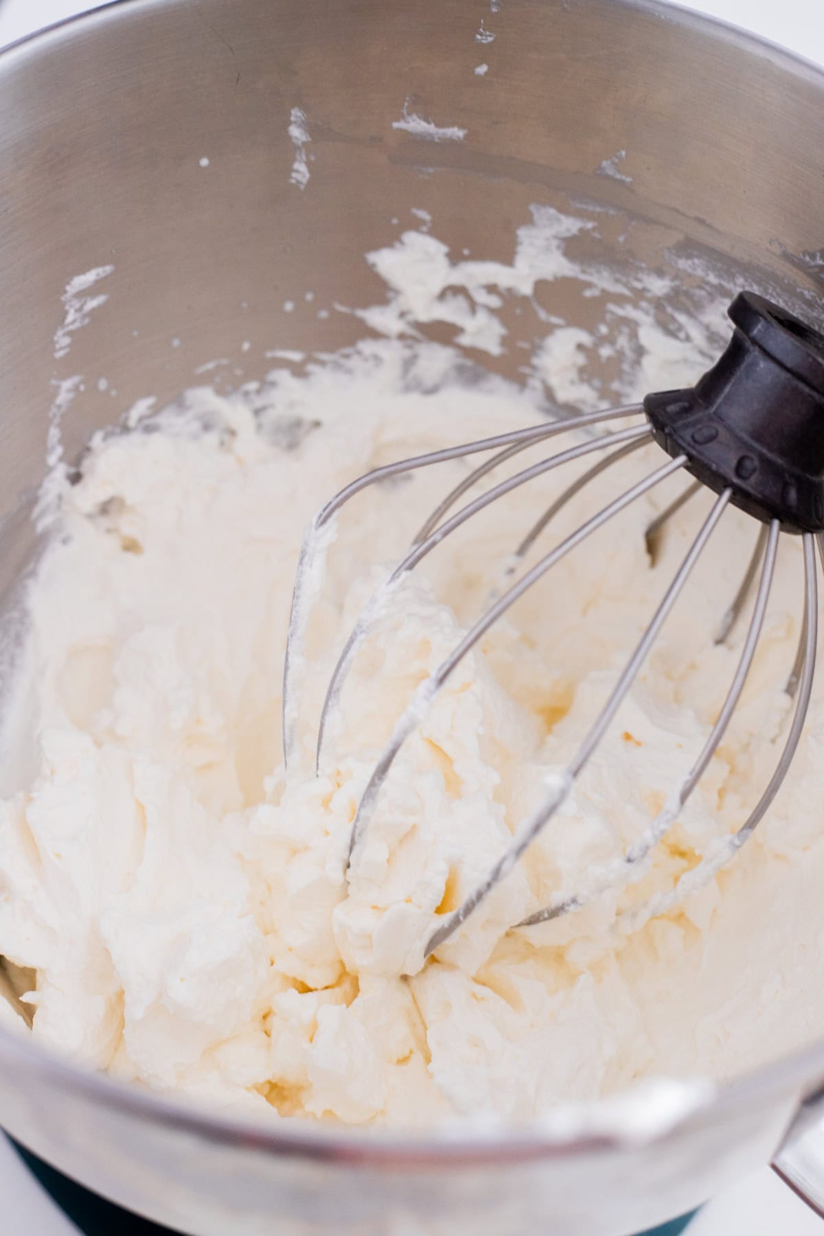 Mixing bowl with homemade whipped cream.
