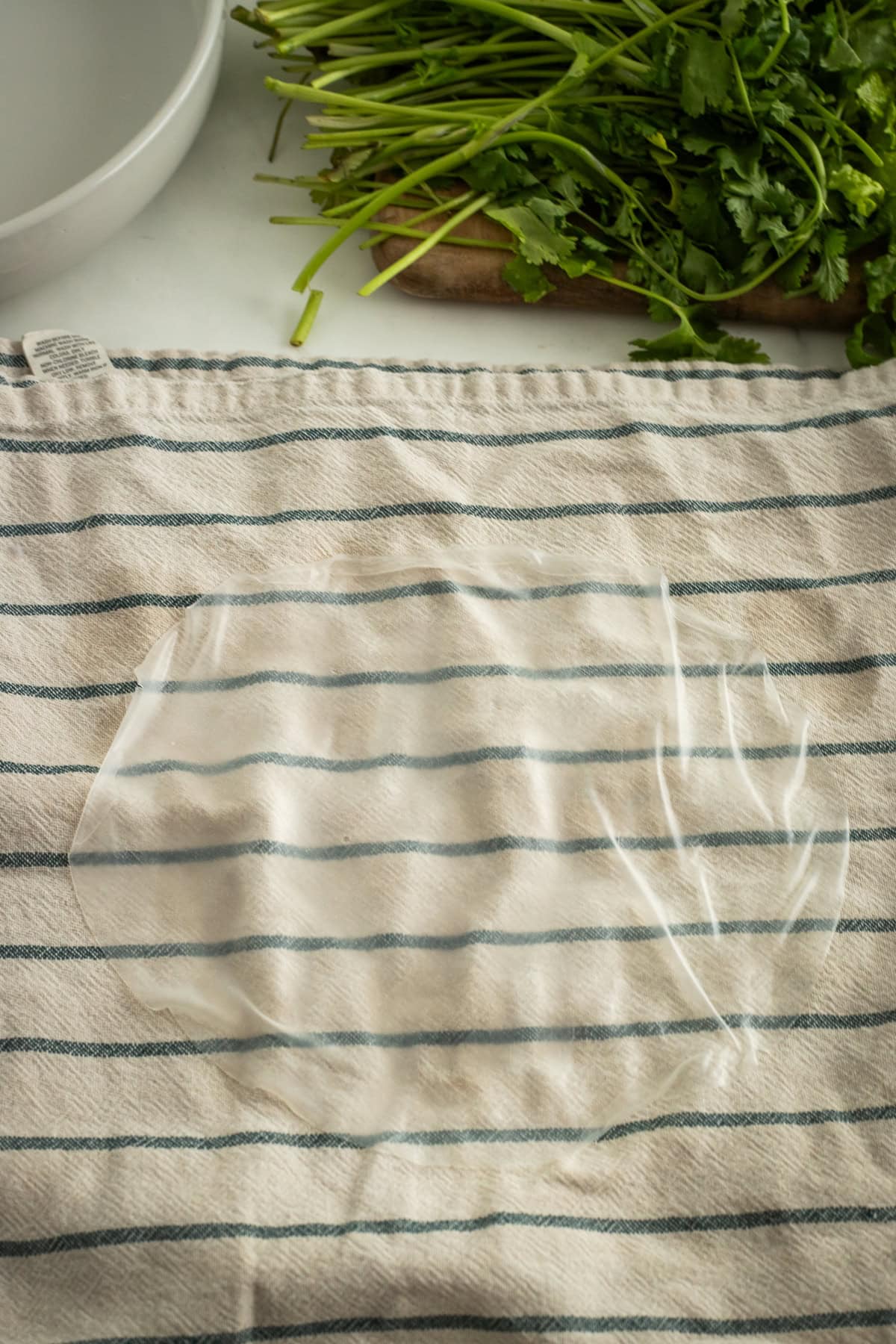 Rice paper laid out on a towel.